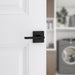 Weiser Halifax square lever handle installed on white interior door