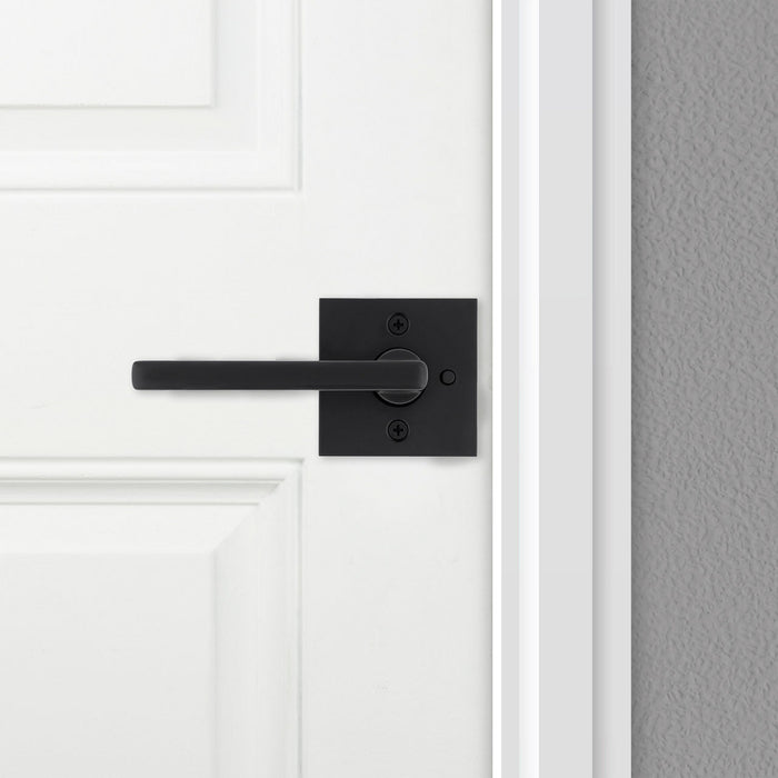 Weiser Halifax square privacy lever installed on modern interior door