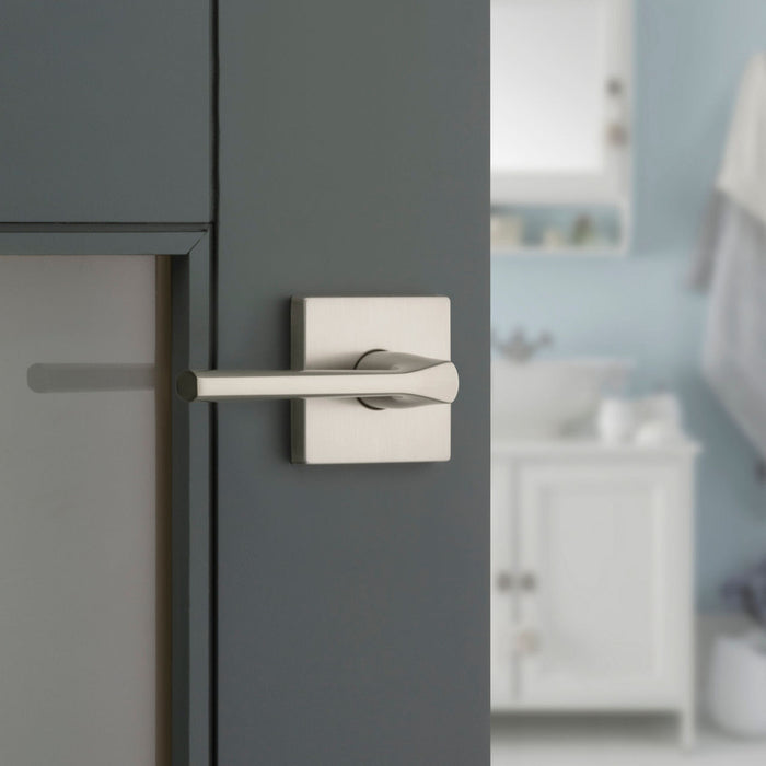 Weiser Lisbon Square Privacy Door Lever Satin Nickel Installed on Bathroom Door