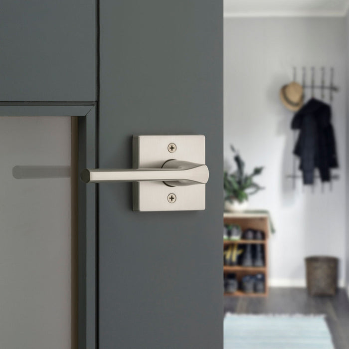 Weiser Lisbon Square Satin Nickel Passage Door Lever Installed on Laundry Room Door