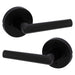 Weiser Milan Round Matte Black Privacy Door Lever Installed on Interior Door