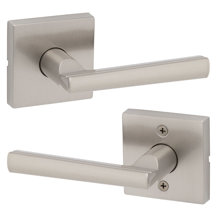 Two Weiser Montreal Satin Nickel door levers showing slim square-tapered design.