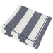 Folded set of blue and ivory wide stripe cotton napkins